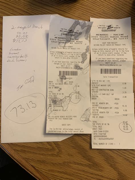 A Receipt Sitting On Top Of A Wooden Table